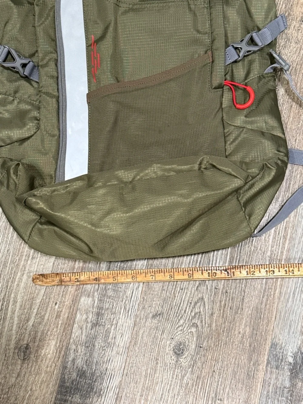 Outdoor Products green roll-top camping backpack